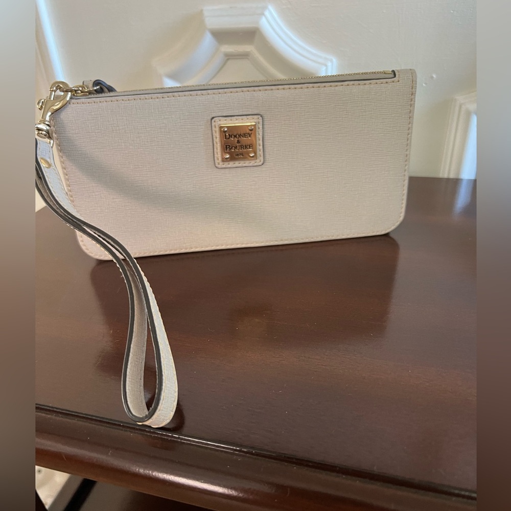 Dooney & Bourke Cream Leather Wristlet with Gold Plaque